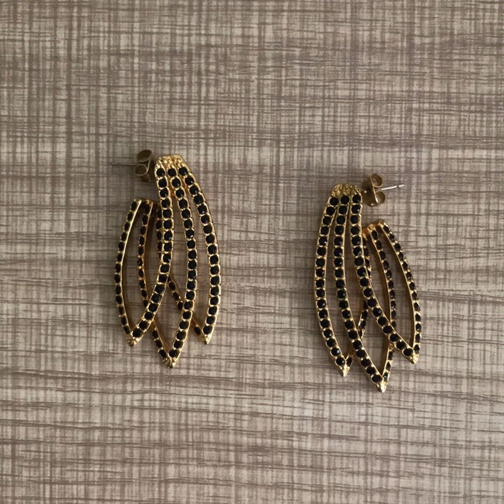 Gold earrings with black stones